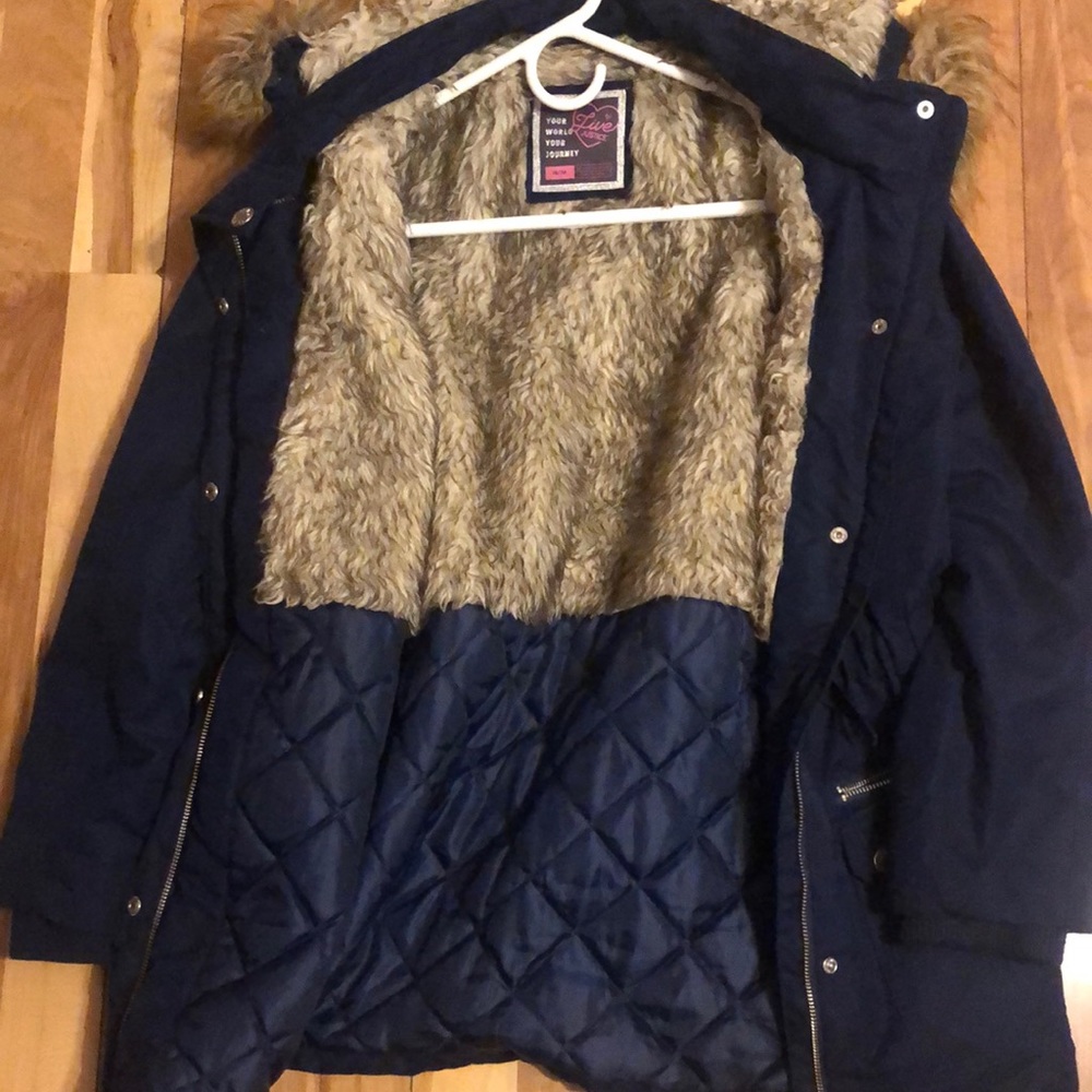 This is a justice coat size 18/20 for $12